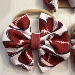 Babygirl Football Bow on Nylon Band